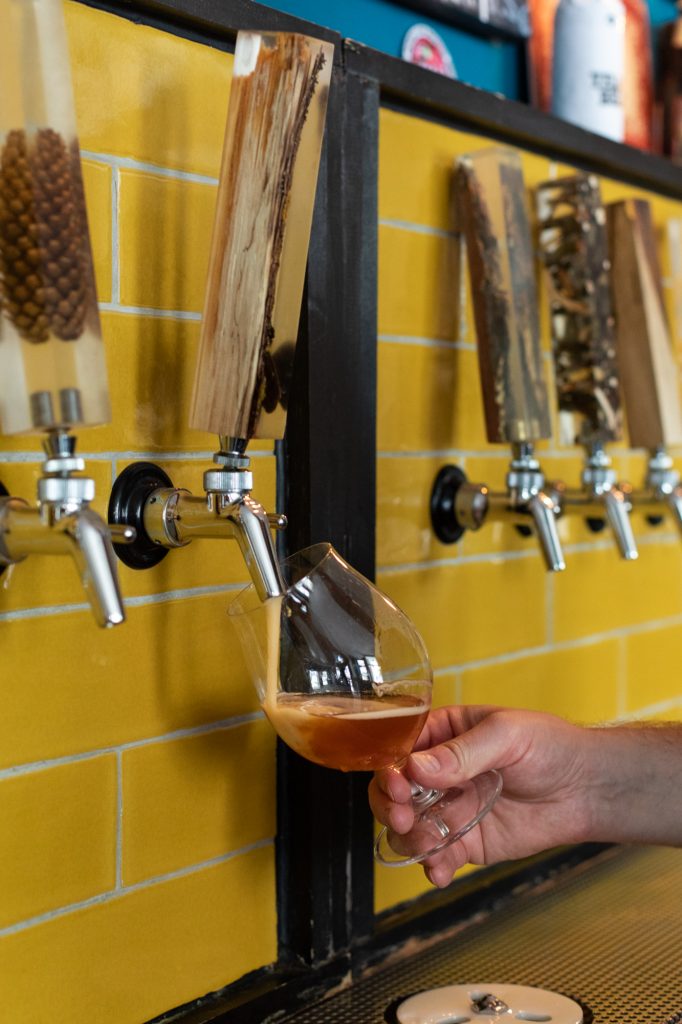 A beer being poured at Protokoll Taproom Berlin, a craft beer bar with 24 taps in Berlin Friedrichshain